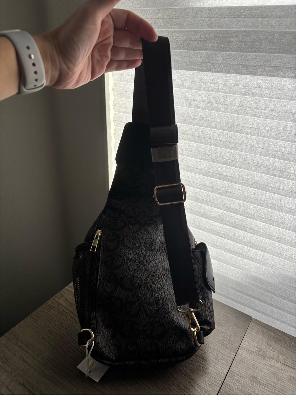 Brown Sling Backpack with Signature Pattern - Picture 2 of 8